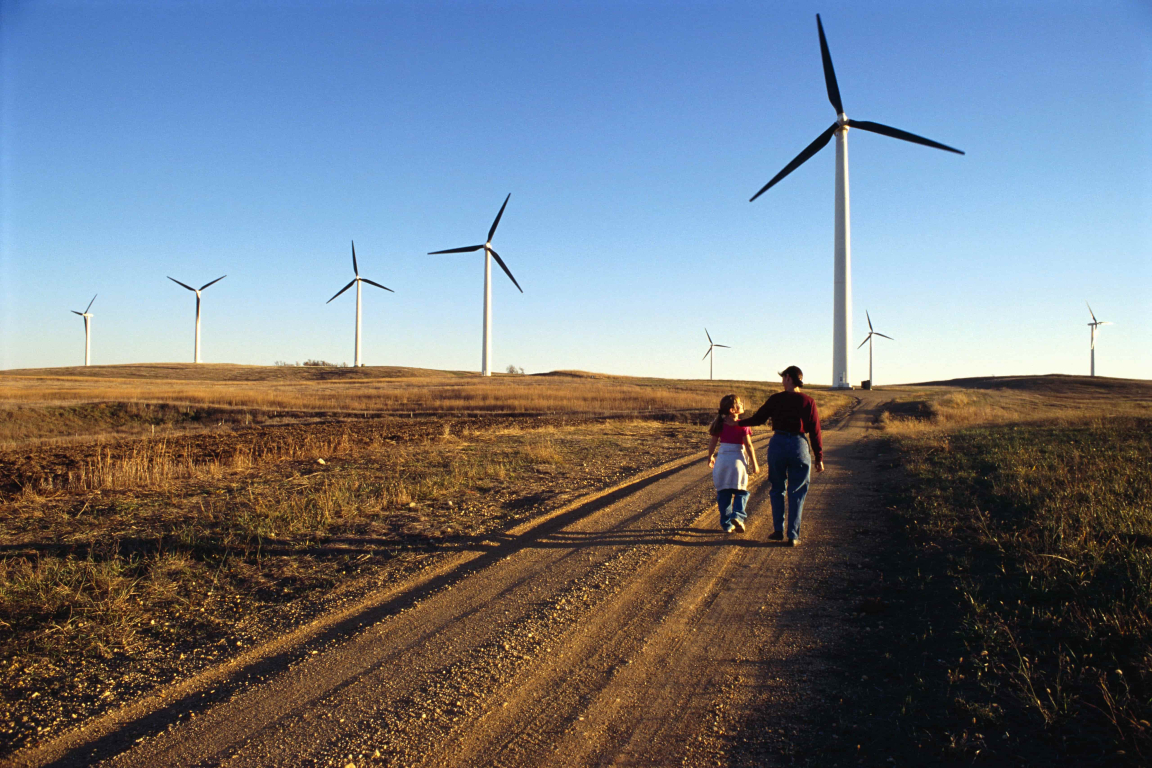 text-image-wind-turbine-daytime-mother-daughter-min